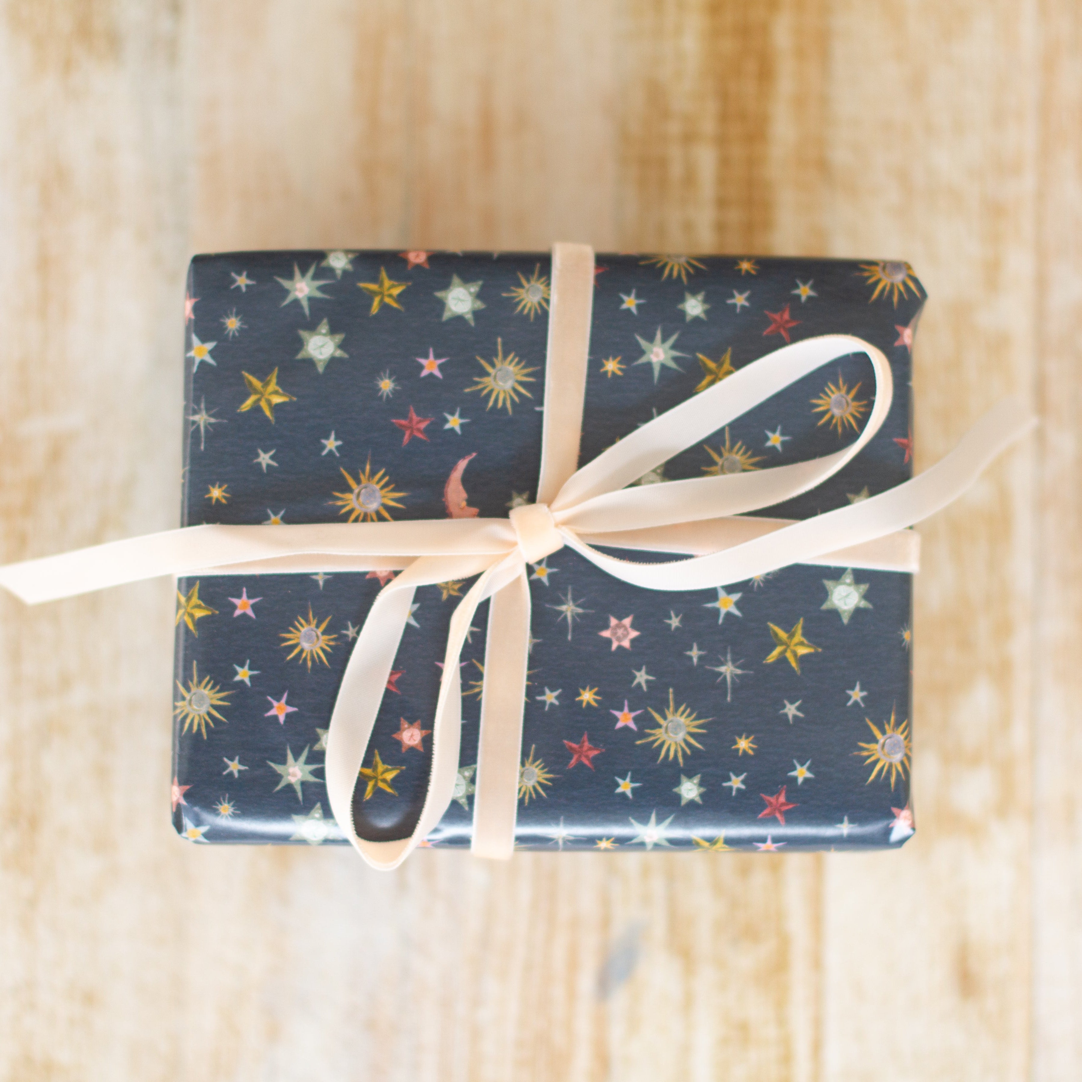 inslee stars and moon painted wrapping paper navy blue