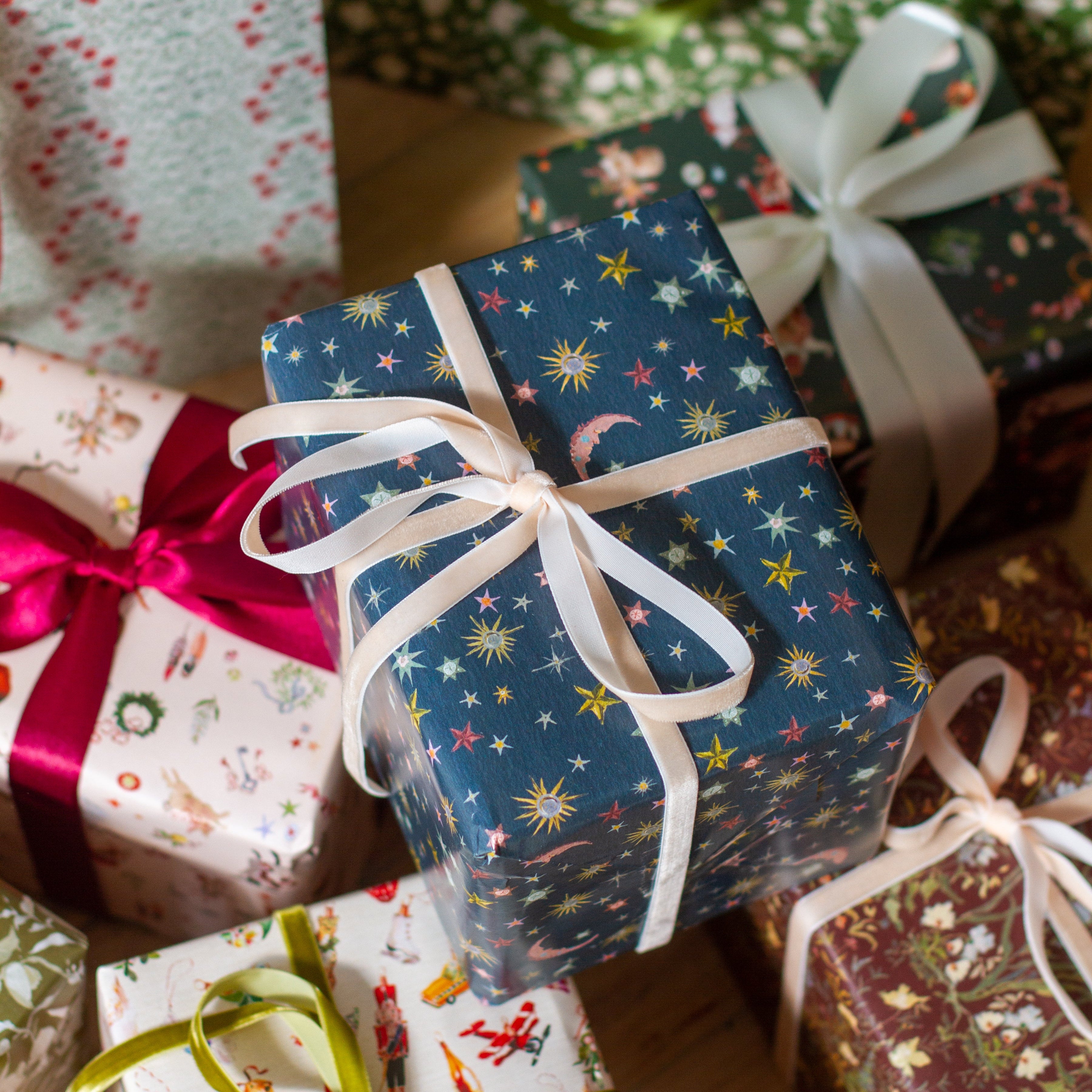 inslee stars and moon painted wrapping paper navy blue